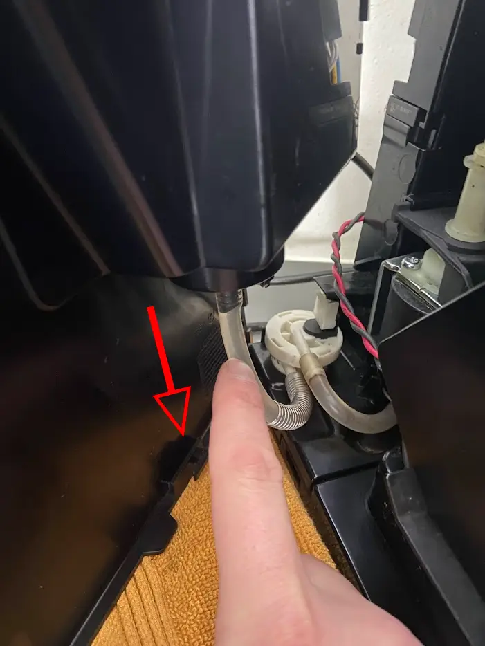 Koppel waterreservoir kap los van machine