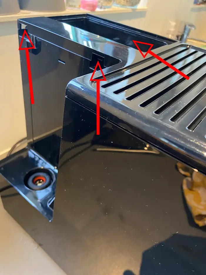 Plaats waterreservoirkap en koffiereservoirkap