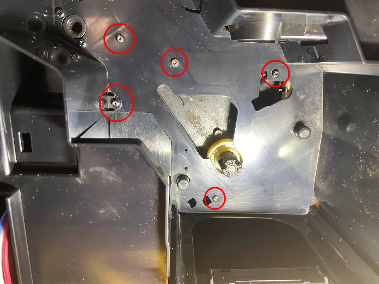 Schroef de aandrijving los