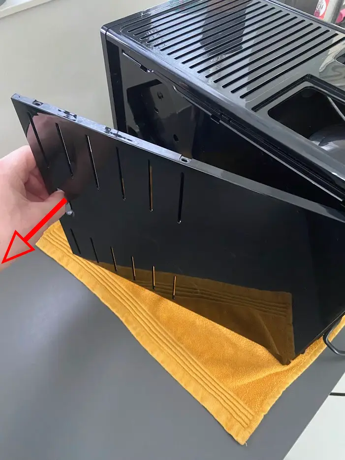 Verwijder zijpaneel Melitta Caffeo Solo